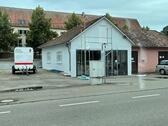 Foto - Autohandelsplatz mit Büro und Aufbereitungshalle