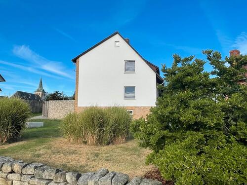 Foto - Freistehendes 1-Familienhaus mit Baugrundstück in ruhiger Lage