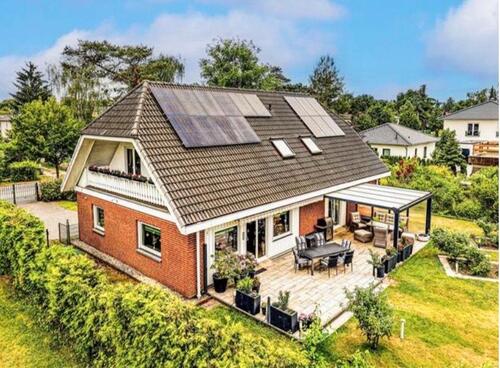 Foto - Einfamilienhaus mit Einliegerwohnung