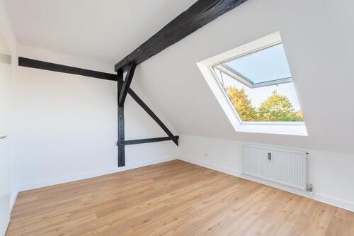 Foto - Großzügige 2-Zi DG-Wohnung, zentral gelegen mit großem Gem.Garten