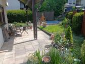Foto - Stilvolle 4,5-Zimmer-Wohnung mit Kamin, Garten, Pool & Garage