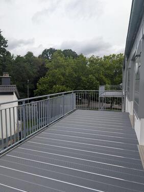 Foto - Neubau: moderne 1,5 Zimmer Wohnung mit Einbauküche, Terrasse und Stellplatz