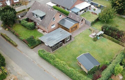 Foto - Wohnhaus mit Einliegerwohnung, voll unterkellert, Baugrundstück
