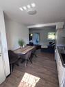 Foto - Moderne 2 Zimmer Wohnung mit Terasse und Garten