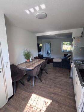 Foto - Moderne 2 Zimmer Wohnung mit Terasse und Garten