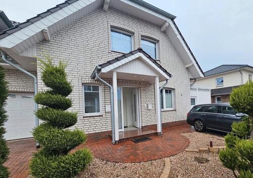 Foto - Erdgeschoss Wohnung mit Garage, große Terrasse und Ofen