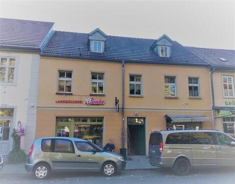 Foto - Mehrfamilienhaus mit Gewerbeeinheiten