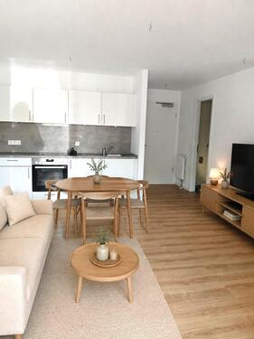 Foto - 1,5 Zimmer Neubauwohnung, EG, Terrasse, Parkplatz zu verkaufen