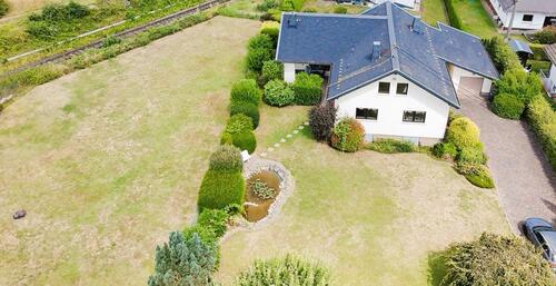 Foto - Grundsolides Einfamilienhaus mit neuster WP- Heizungsanlage