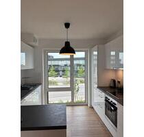 Exklusive 2-Zimmer-Neubauwohnung mit Loggia & Tiefgarage - Kirchheim bei München