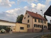 Foto - Rümmingen: Zweifamilienhaus mit Gewerbeeinheit und Baureserve