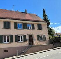 Rümmingen: Zweifamilienhaus mit Gewerbeeinheit und Baureserve