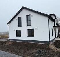 Puchheim Neubau 4-Zi EG Wohnung mit Hobbyraum und Garten