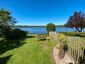 Foto - Urlaub am Timmeler Meer, Ferienhaus am See Sauna Steg Boot Angeln