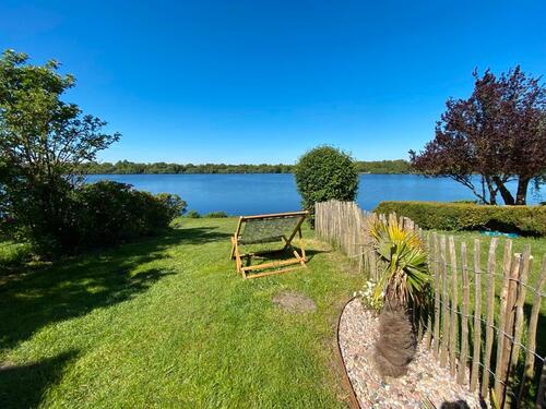 Foto - Urlaub am Timmeler Meer, Ferienhaus am See Sauna Steg Boot Angeln