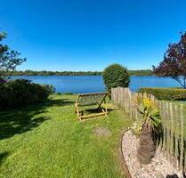 Urlaub am Timmeler Meer, Ferienhaus am See Sauna Steg Boot Angeln - Halver