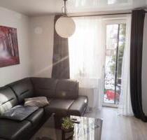 Modernisierte Terrassenwohnung mit Kamin & direktem Gartenzugang - Kassel Nordshausen