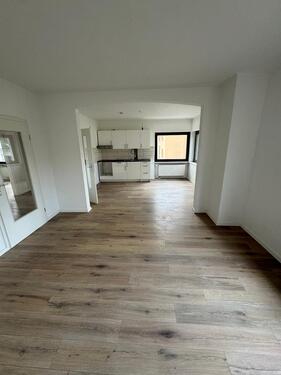 Foto - 75 m² Erdgeschosswohnung mit großer Wohnküche, Garage und Keller