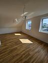 Foto - Moderne kernsanierte Dachgeschosswohnung in zentraler Wohnlage
