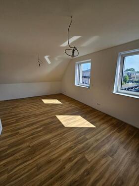 Foto - Moderne kernsanierte Dachgeschosswohnung in zentraler Wohnlage