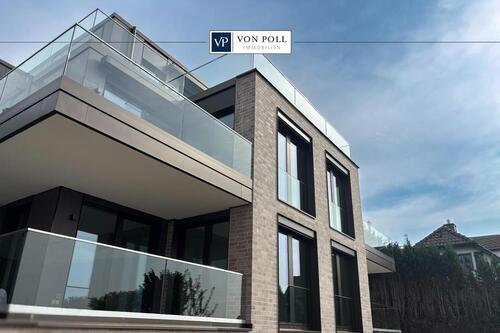 Foto - Luxuriöses Wohnen im Erdgeschoss mit Einliegerwohnung und modernster Ausstattung