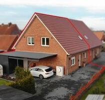 Neubau-Doppelhaushälfte in Kanallage von Großefehn