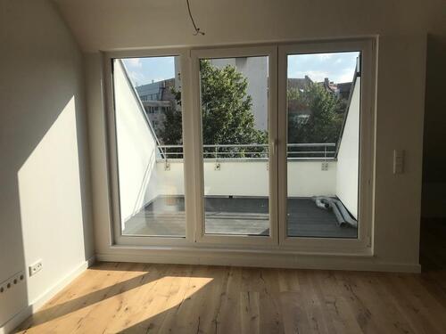 Foto - Moderne Neubau-Dachgeschosswohnung mit großer Loggia