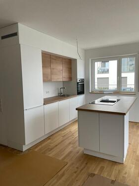 Foto - Moderne 2-Zimmer Wohnung im Neubaugebiet Sonnenrain mit EBK