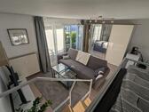 Foto - 1-Zimmerwohnung mit Loftbett, Wlan, TV, DuscheWC, Küche, Waschmaschine, Trockner, Parkplatz, Haustiere willkommen