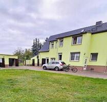 Einfamilienhaus mit Garagen und Nebengelass - Delitzsch