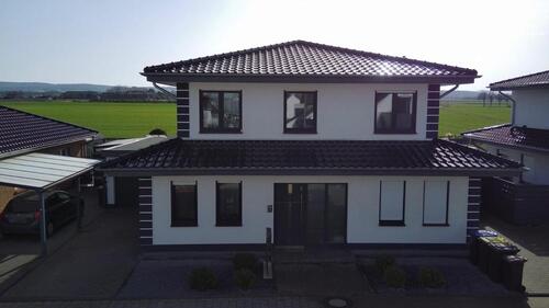 Foto - Freistehendes Zweifamilienhaus mit Garten und 2 Garagen