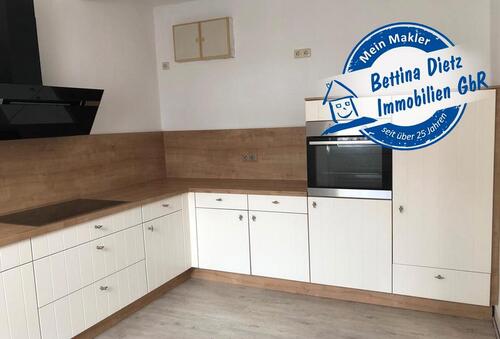 Foto - DIETZ: 2-3 Zimmer Wohnung mit schöner Einbauküche und Holzofen in ruhiger Wohnlage!