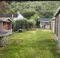 Ferienhaus am See Vlotho Wasserzugang Fewo Sauna Steg Wohnen