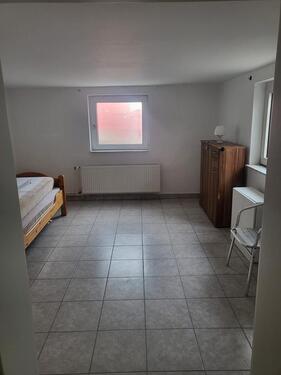 Foto - 1-Zimmer-Souterrainwohnung mit großem Garten zu vermieten