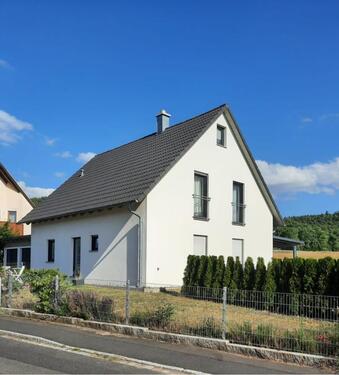 Foto - Einfamilienhaus mit Luftwärmepumpe