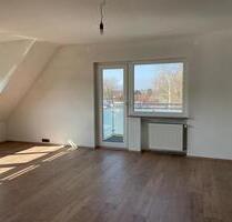 Lichtdurchflutete 2-Zimmer-Wohnung mit Balkon in Trohe – 70 m² - Buseck