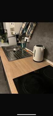 Foto - ein möbliertes Zimmer in einer WG