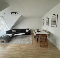 Helle Dachgeschosswohnung mit Balkon im Zentrum und Rheinnähe - Niederkassel