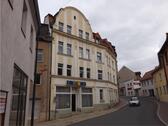 Foto - Mehrfamilienhaus mit Wohnungen und Gewerbeeinheit - teilvermietet