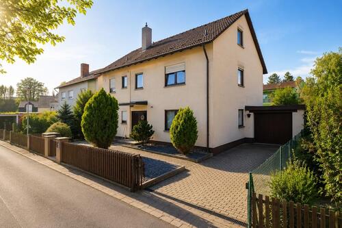 Foto - Familienfreundliches Erdgeschoss mit Garage & großzügigem Garten