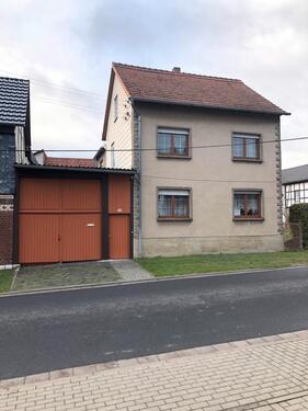 Foto - Einfamilienhaus mit Nebengelass und Gartenanteil