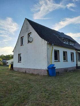 Foto - Baugrundstück mit Doppelhaushälfte