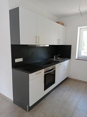 Foto - 2 - Zimmer - Dachgeschosswohnung in einem Mehrfamilienhaus