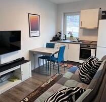 Ruhig im Grünen: 2-Raum-Souterrainwohnung mit Stellplatz - Bucha