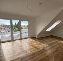 Dachgeschosswohnung mit Balkon u. Stellplatz in Köln-Lövenich Erstbezug Neubau Wärmepumpe Aufzug