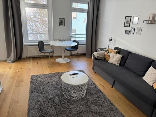Foto - Voll möbliertes 1-Zimmer-Apartment mit Einbauküche in zentraler L