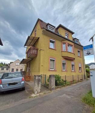 Foto - Mehrfamilienhaus, Gewerbeeinheit, Garagen und Halle