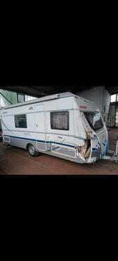 Foto - Stellplatz für Wohnmobil -Wohwagen . Boot Auto.Oltime