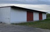 Foto - Lagerhalle und Außenstellfläche zu vermieten