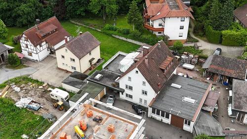 Foto - Mehrfamilienhaus mit Gewerbeeinheit, Wintergarten und 4 Garagen